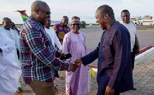 Former  President John Dramani Mahama in a hand shake with Alban Bagbin