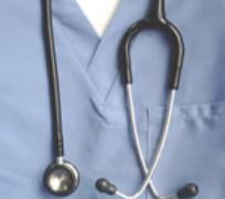Doctor's stethoscope and lab. coat.     File photo.