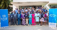 Participants in a group photo after the first session