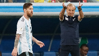 Lionel Messi and Benin coach Gernot Rohr