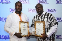 Mr. Albert Biga (right) and Mr. Andrew Aguda displaying their awards