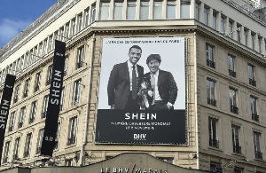 A Shein advertisement outside its first permanent store in Paris, France