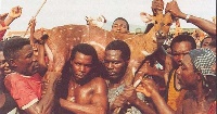 Some indigenes displaying the antelope after catching it