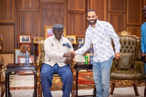 Ali Ajami with former president John Agyekum Kufuor