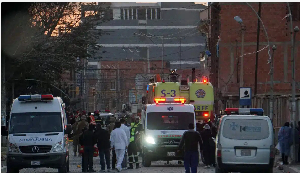 People run for shelter after explosion at Bolivia military barracks