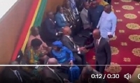 Johnson Asiedu Nketiah approaching Nana Konadu Agyeman-Rawlings (seated in blue)