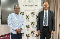 TOUGHA president, Yvonne Donkor (L) and Dominic Louis, Head of Sales at Air Tanzania Company (R)