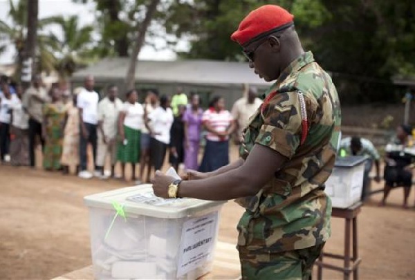 File photo: A military personnel casting his vote