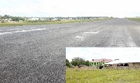 The runway of the Wa airstrip. Some encroachers on the land [Inset]