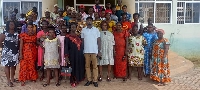 A group picture of Akwasi Darko Boateng and some traders
