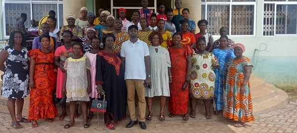 A group picture of Akwasi Darko Boateng and some traders