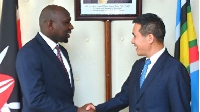Kipchumba Murkomen (left) with China’s ambassador to Kenya Zhou Pingjian PHOTO | COURTESY