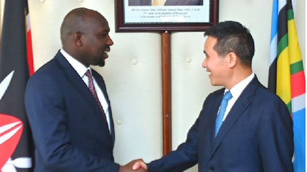 Kipchumba Murkomen (left) with China’s ambassador to Kenya Zhou Pingjian PHOTO | COURTESY
