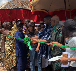John Dumelo, Deputy Minister of Food and Agriculture, cuts the ribbon