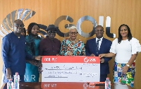 Rev. Dr. Joyce Aryee, Chairman of the Appiatse Support Fund receiving the donation