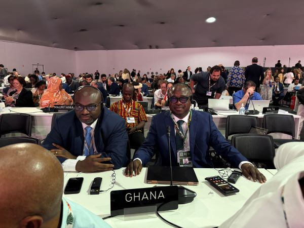 Seidu Issifu (R) and team at the COP30 opening session