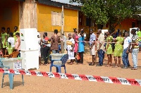 Eligible voters casting their votes