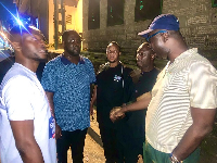 Baffour Awuah (blue cap) interacting with some supporters of the party