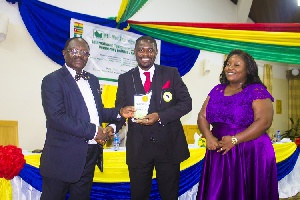 Dr Adu Boateng and Mrs Deborah Paintsil receiving the award