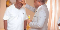 Assemblies of God superintendent, Rev Stephen Wengam, with President Mahama