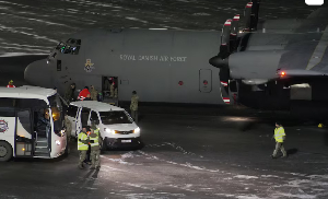 A Royal Danish Air Force plane carrying personnel in military fatigues lands at Nuuk airport A Royal Danish Air Force plane carrying personnel in military fatigues lands at Nuuk airport