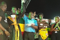 Ghana's Faisal Abubakar with his hand lifted up