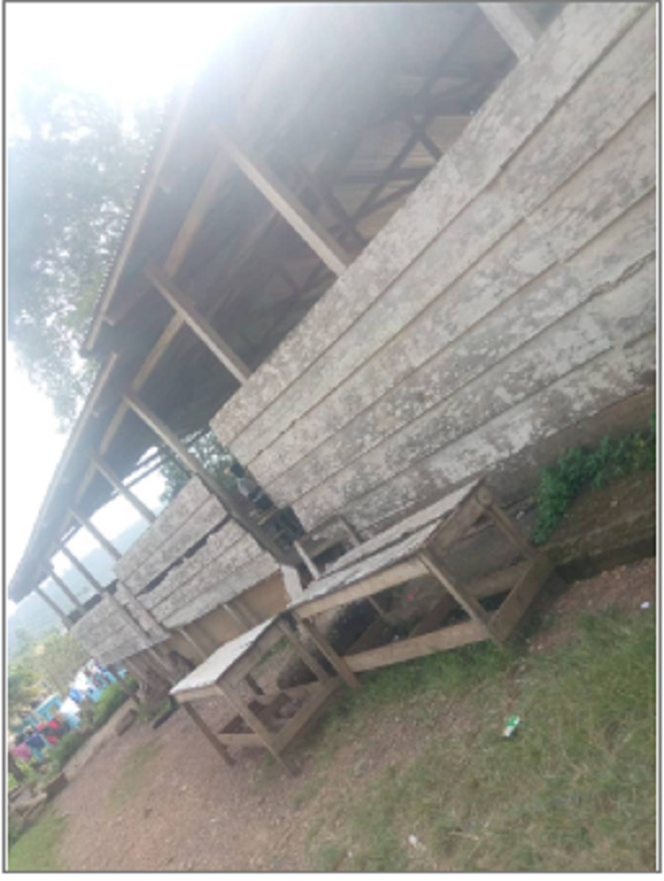 Picture of the wooden structure used as dining and assembly hall