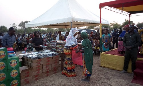 The Second Lady, Hajia Samira Bawumia presenting some items to a widow in the Northern Region