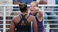 Ostapenko (R) and Townsend (L) got into a heated argument after their match