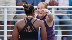 Ostapenko (R) and Townsend (L) got into a heated argument after their match