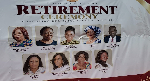 A banner with portraits of all nine retirees