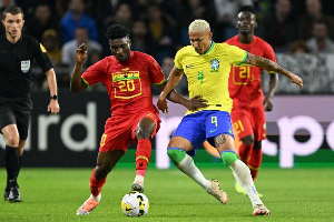 A photo of Mohammed Kudus and  Richarlison