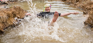 Democratic Alliance politician Helen Zille swims in a trench Democratic Alliance politician Helen Zille swims in a trench
