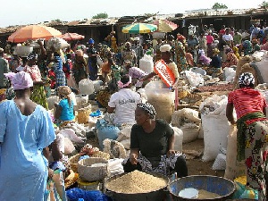 Traders at the market.     File photo.