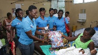 The team from Voltic donating assorted items to teenage mothers