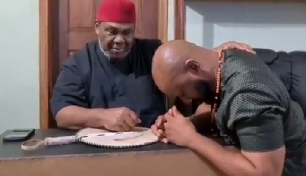 Yul Edochie being consoled by his father, Pete