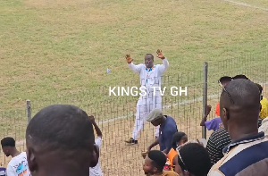 Baffour Awuah gesturing towards the fans to restore calm PC:KingsTVGH