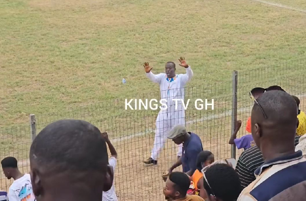 Baffour Awuah gesturing towards the fans to restore calm PC:KingsTVGH