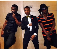 Wizkid (middle) with Omar Sterling (L) and Mugeez (R)