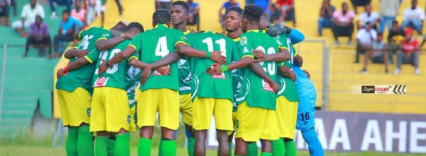 Aduana players offering prayers before the match