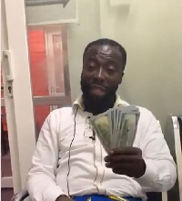 Andy Dosty received the money on behalf of his team