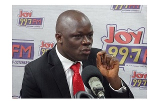 Samson Lardy Anyenini, is host for Joynews' Newsfile program