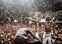 Shatta Wale performing in the rain at SallahFest