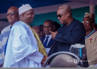 Adama Barrow and Former President John Dramani Mahama exchanging pleasantries