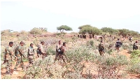 Somalian Army members patrol during an operation