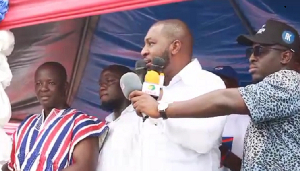 Kwabena Asamoah (white) speaking at the campaign launch