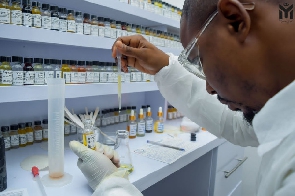 Ghanaian perfumer Yusif Meizongo making what he knows to do best