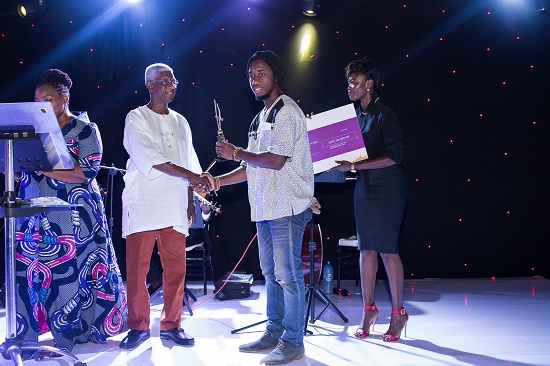Bright Tetteh Ackwerh recieving his award
