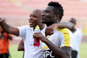 Ex-Black Stars skipper, Asamoah Gyan (holding a bottle) and Dede Ayew