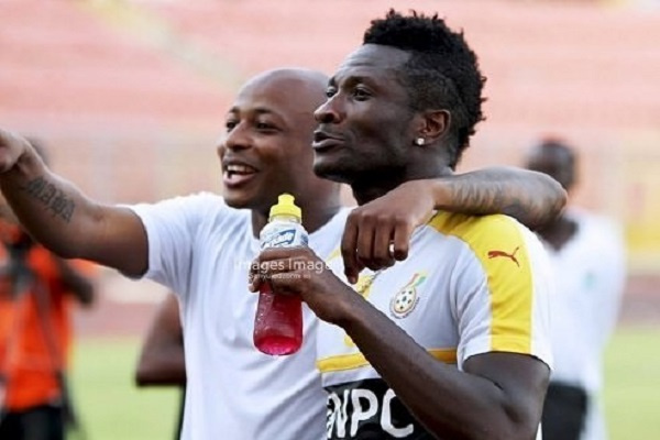 Ex-Black Stars skipper, Asamoah Gyan (holding a bottle) and Dede Ayew